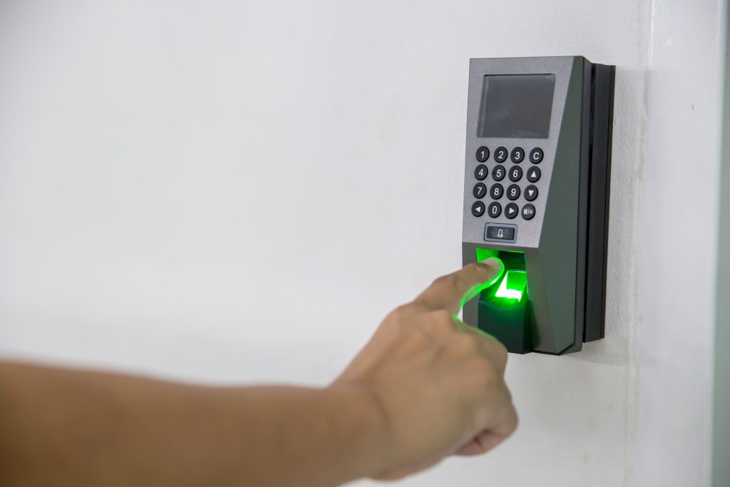 worker using a digital work attendance machine